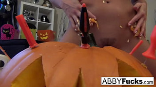 Abigail carves a pumpkin then plays with herself
