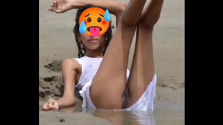 Nude model in a public beach photoshoot. Small boobies nice behind