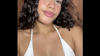 Innocent chick with a tender face masturbate her cunt in a miniskirt