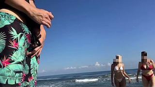 Lucky hubby meets 2 horny whores on the beach while masturbating in public