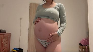 Pregnant Indian stepsister goes into the bathroom and shows off her giant belly, then masturbation and plays with her cunt until she has an cumming. She does a camel toe vagina and plays with her belly to