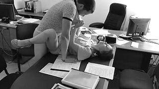 The boss mounts his tiny secretary on the office table and films it on voyeur web camera